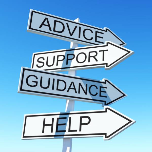 4 signs pointing the way to advice, support, guidance and helpful